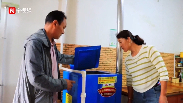 村民使用戶用生物質鍋爐取暖